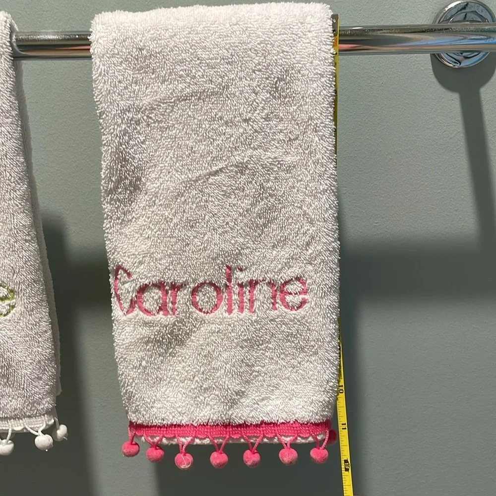 Two Raffia hand towels monogrammed with Caroline